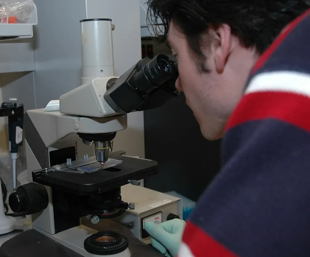 The $112 Million Question: What Happens When Health Data Systems Break? Researcher examining samples while working in a laboratory