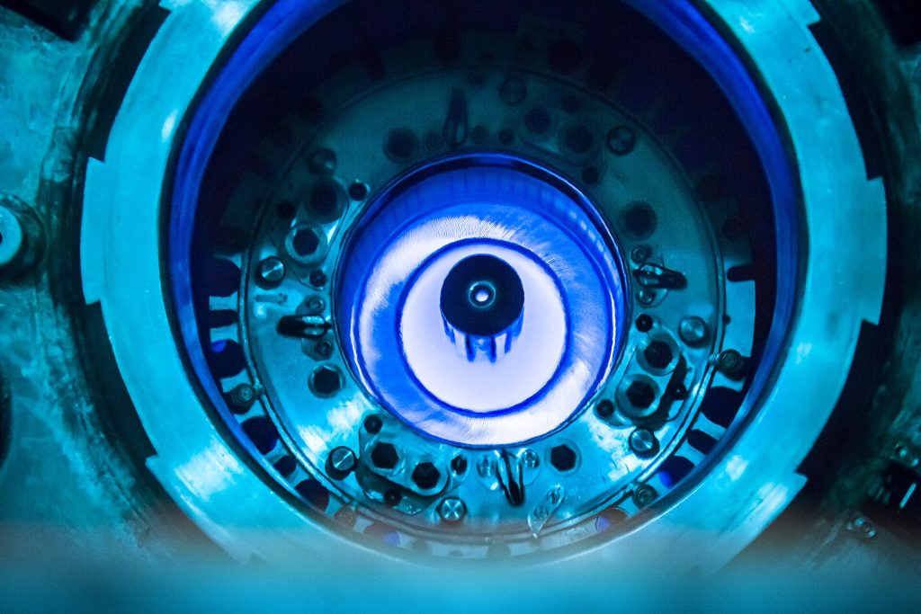 A glowing research reactor core seen from above