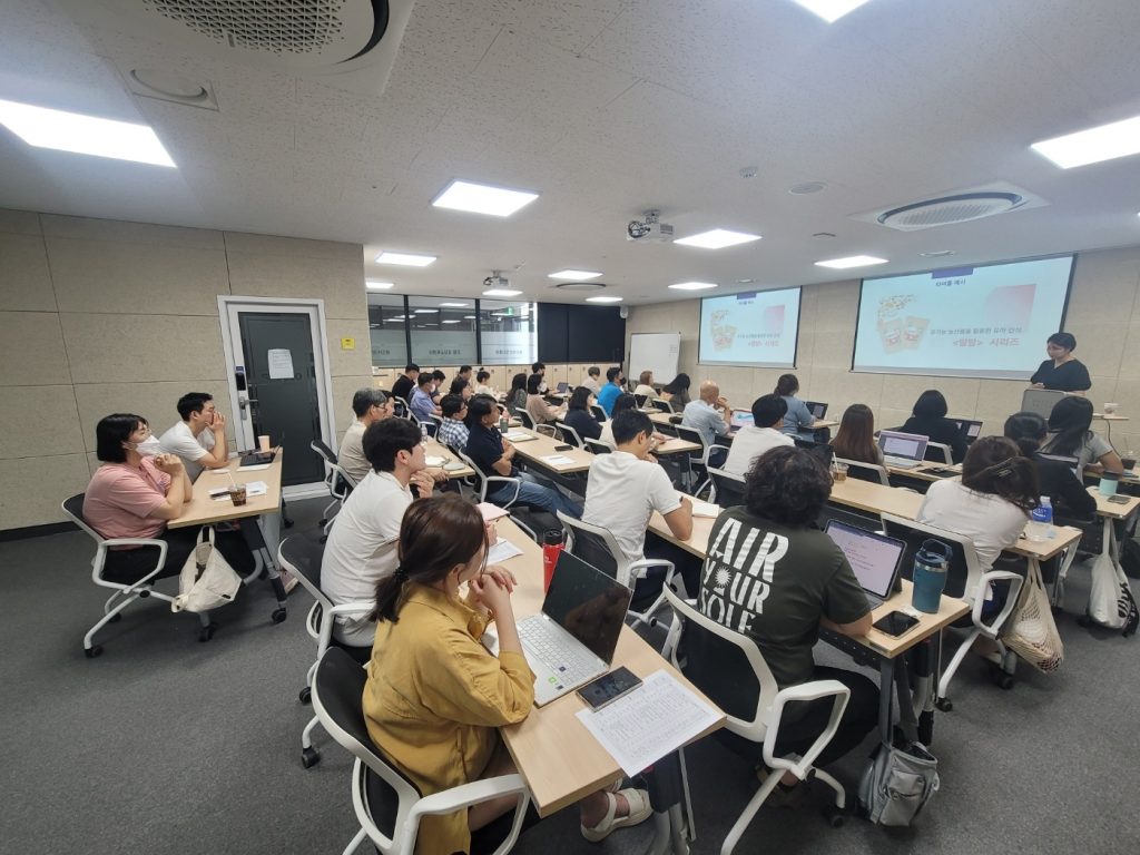 Teenagers working on paper exercises in a phone-free classroom